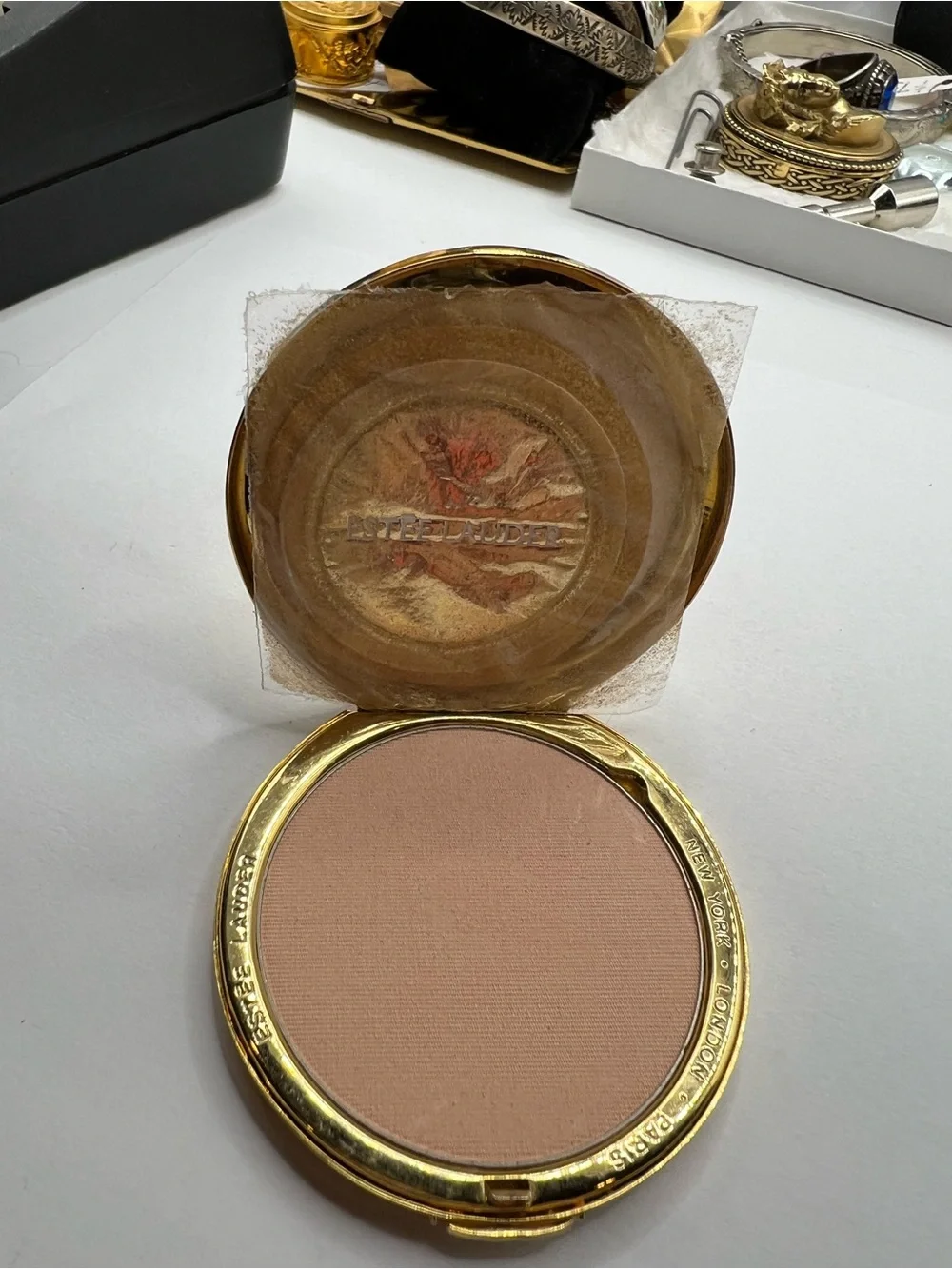 Gold Shell Compact Mirror by Estée Lauder